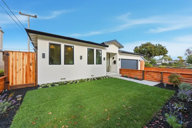 a front view of house with yard