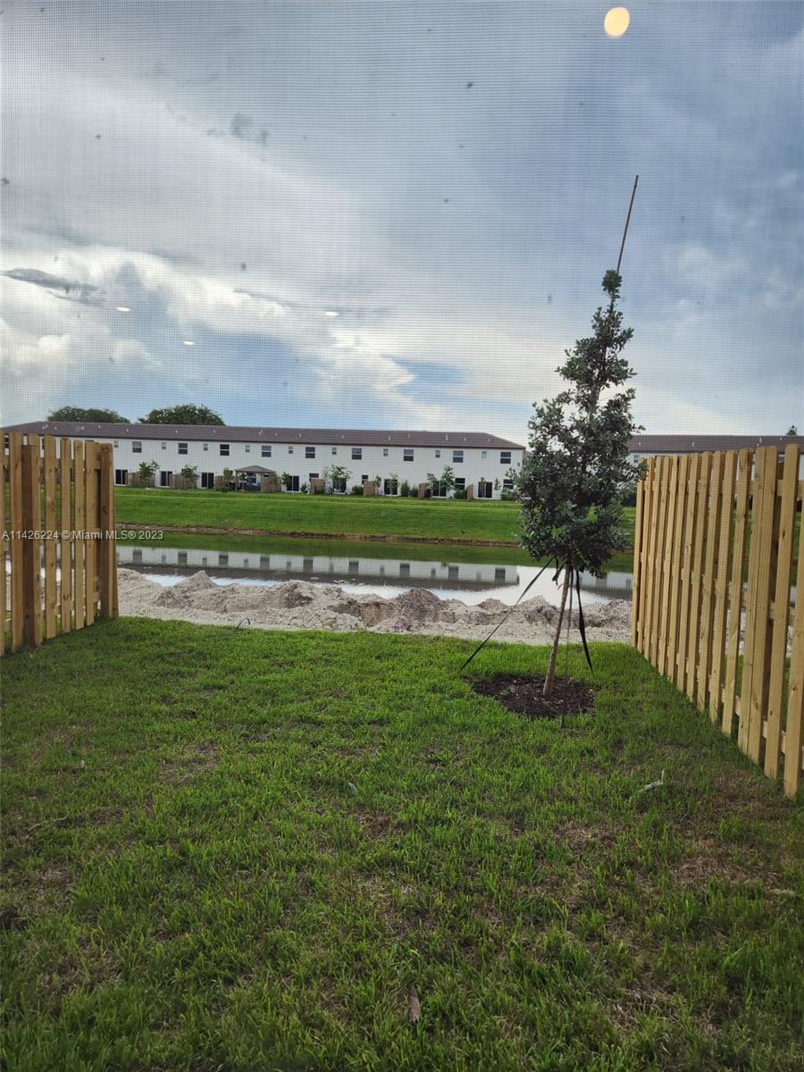 Miami-Dade County Miami, FL 33167 - Photo 14 of 18 a view of a lake with a big yard