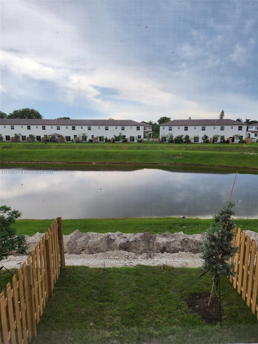 Miami-Dade County Miami, FL 33167 - Photo 15 of 18 a view of a lake with a big yard