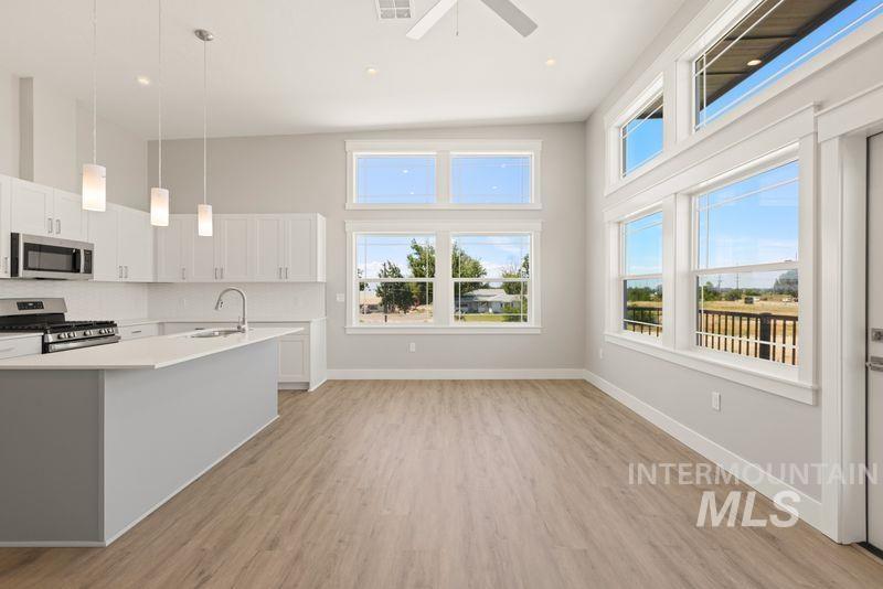 12545 West State Street, Unit 1 Star, ID 83669 - Photo 10 of 21 Residential with vaulted ceilings, gas fireplace
