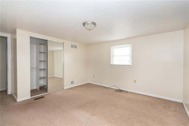 556 East Madison Street Rochester, PA 15074 - Photo 14 of 19 MBedroom features double closet with California style shelving. Ready to move in!