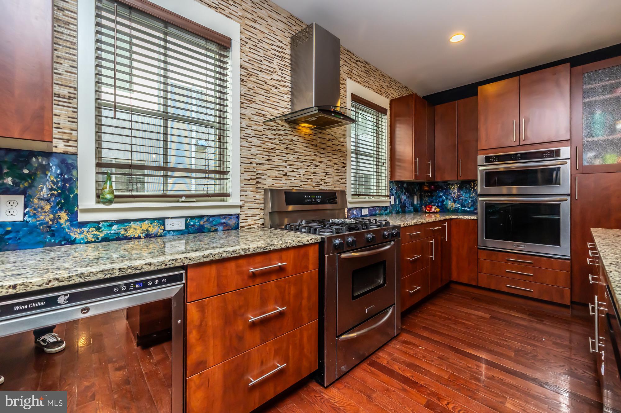 119 Federal Street Philadelphia, PA 19147 - Photo 18 of 51 Modern kitchen with vibrant backsplash.