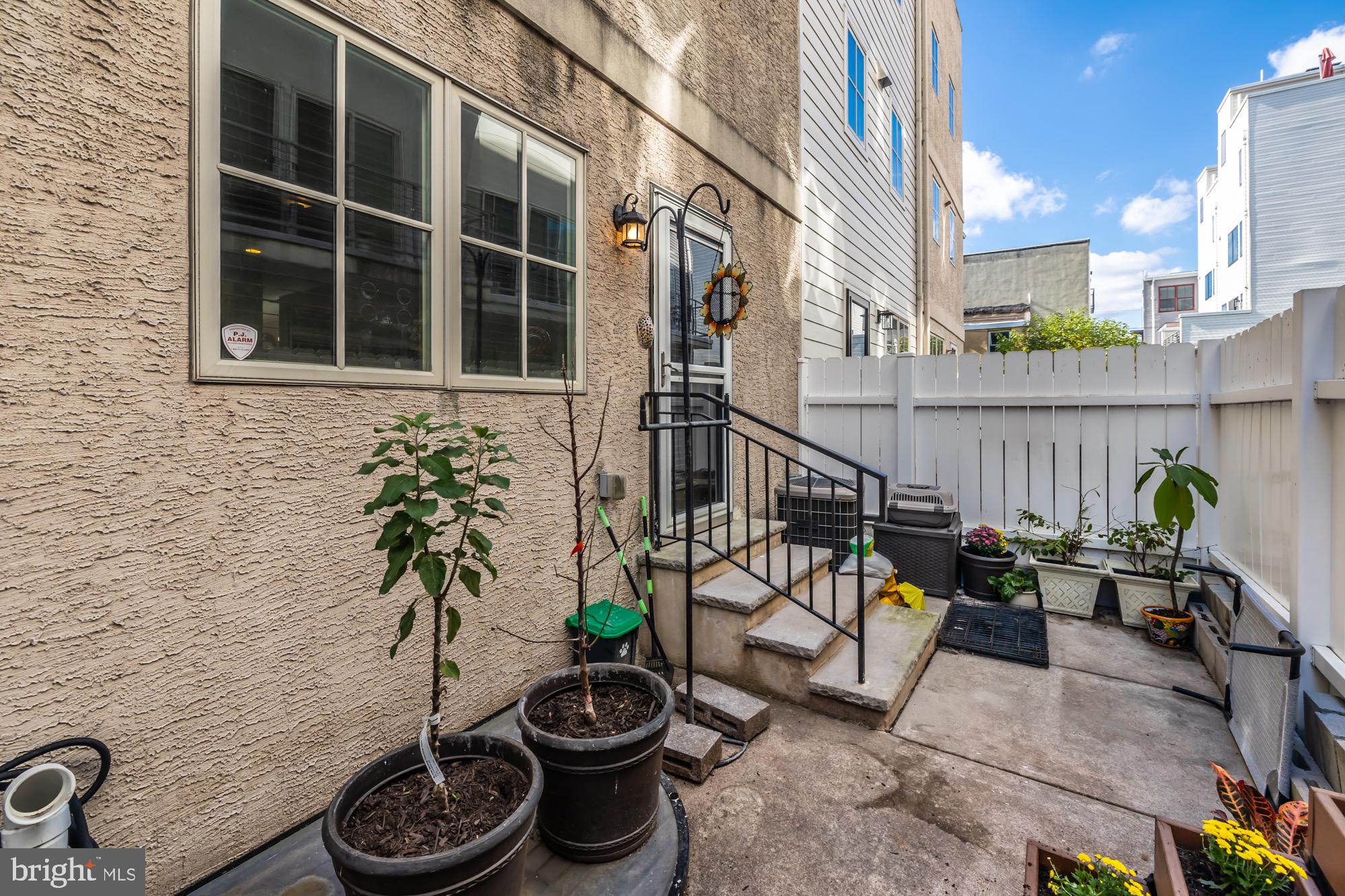 119 Federal Street Philadelphia, PA 19147 - Photo 47 of 51 Charming backyard oasis with greenery.