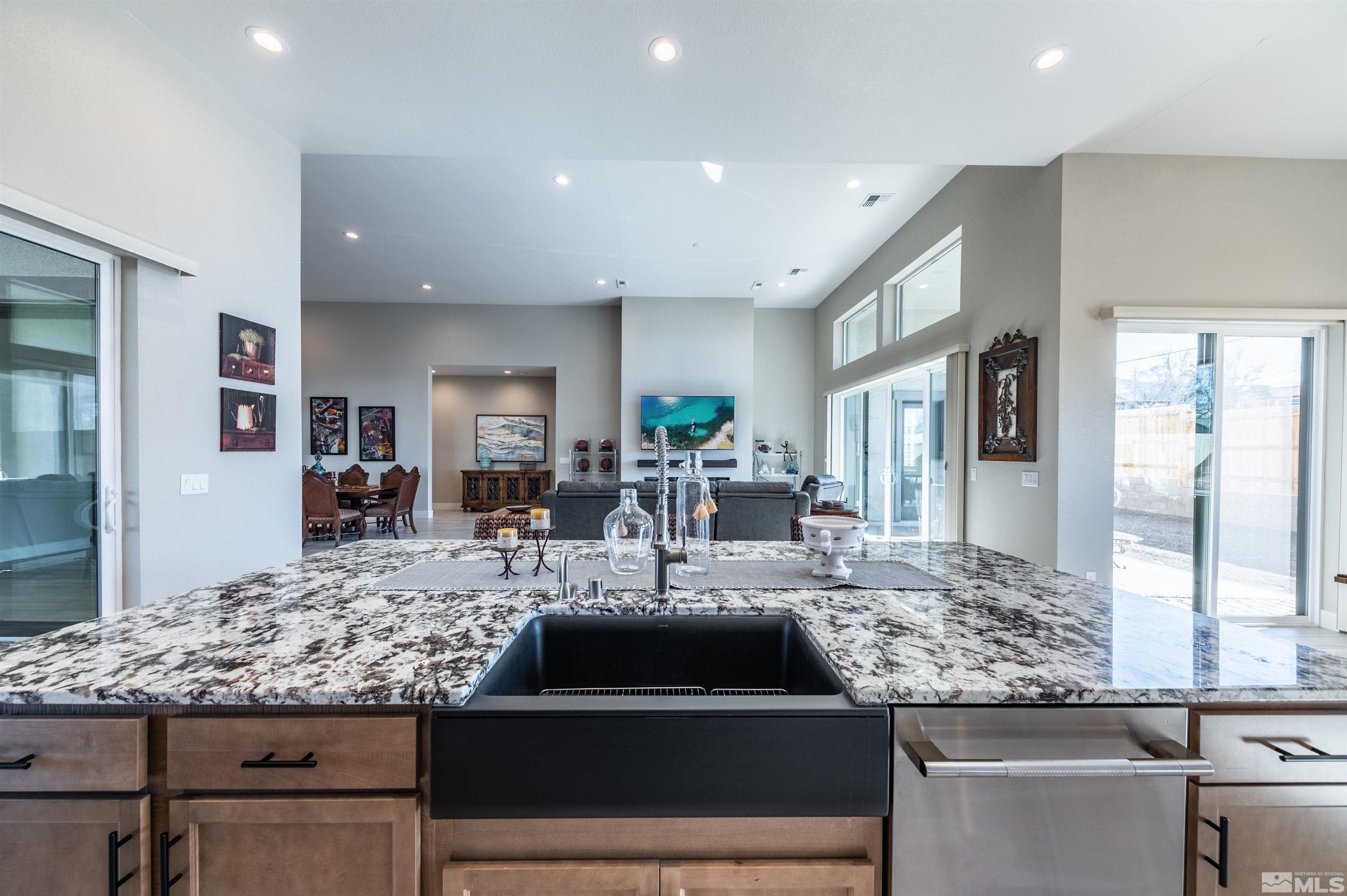 2962 Saddle Peak Drive Reno, NV 89521 - Photo 15 of 39 a view of a kitchen with granite countertop a counter top space appliances and cabinets