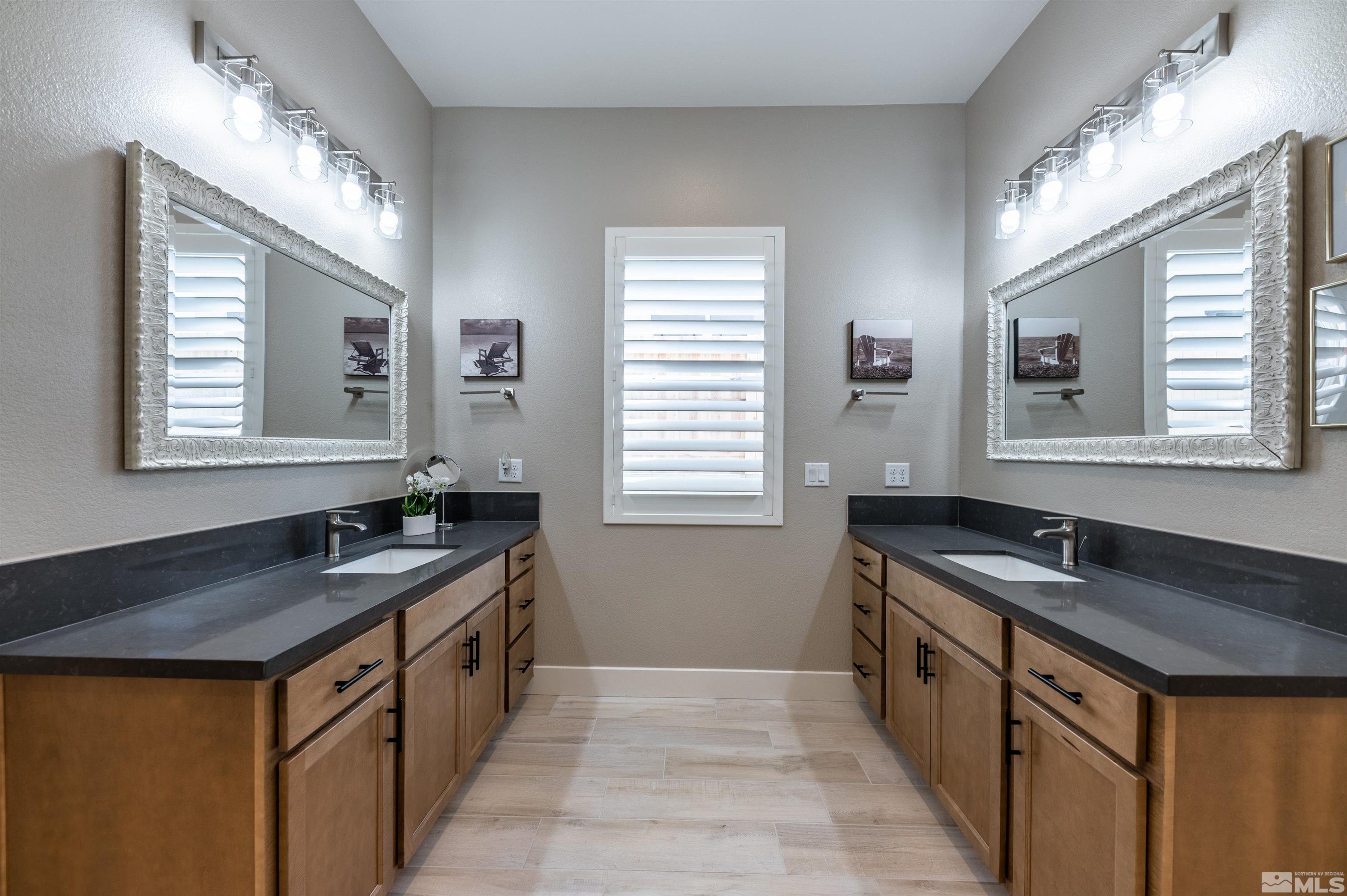 2962 Saddle Peak Drive Reno, NV 89521 - Photo 22 of 39 a kitchen with granite countertop a sink and a stove