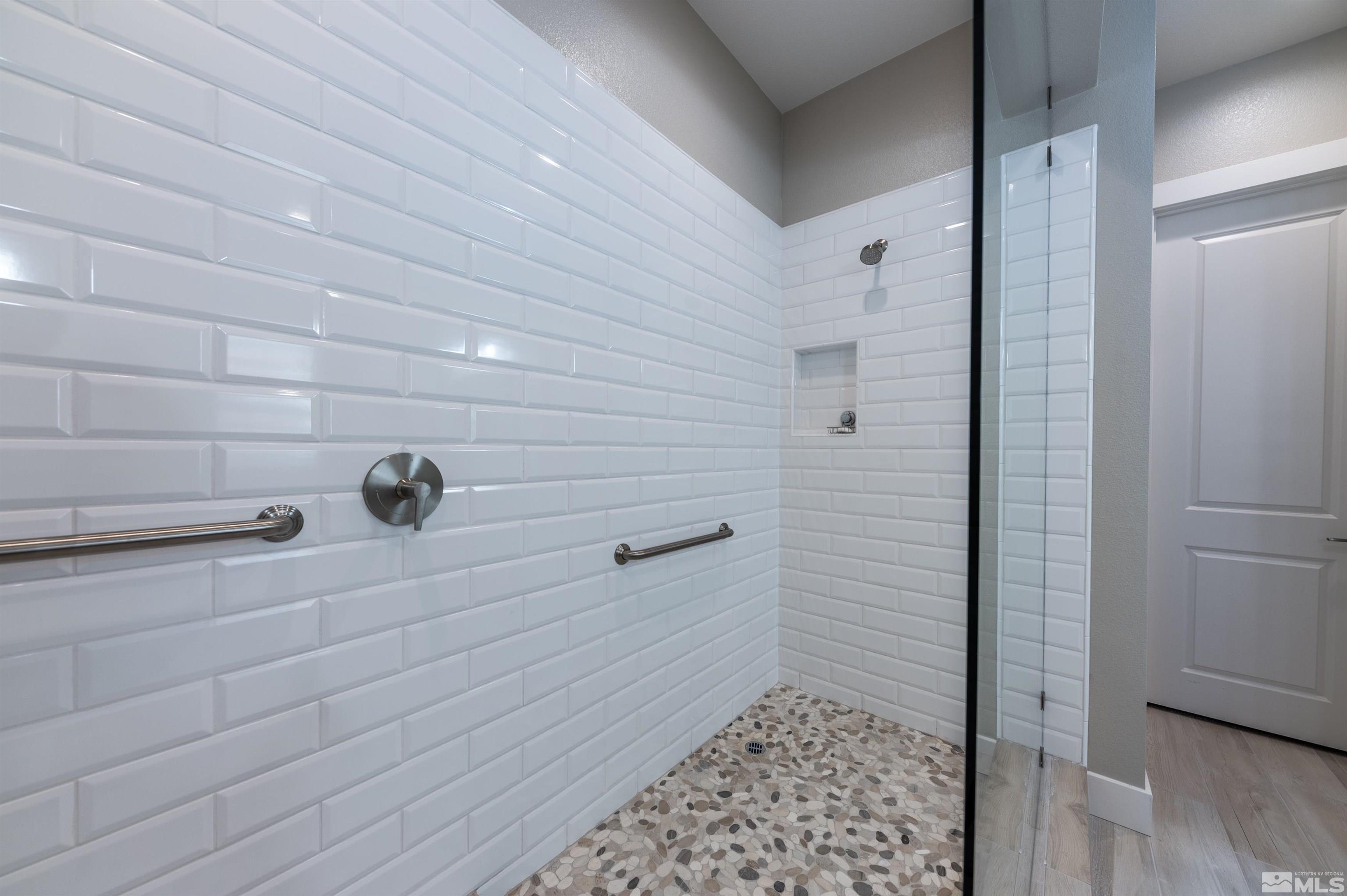 2962 Saddle Peak Drive Reno, NV 89521 - Photo 23 of 39 a bathroom with a shower