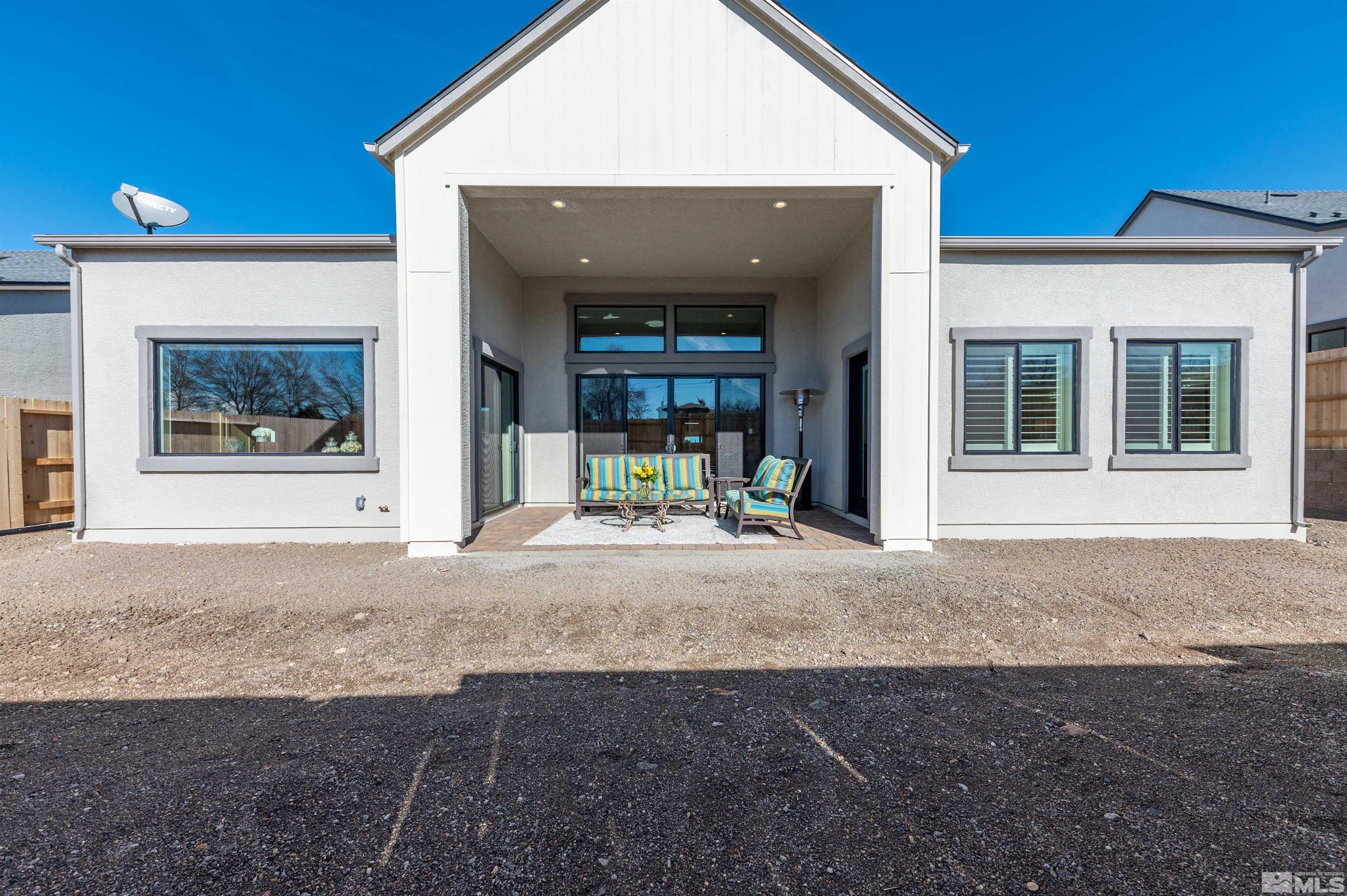 2962 Saddle Peak Drive Reno, NV 89521 - Photo 3 of 39 a view of a house with large space and a car parked car