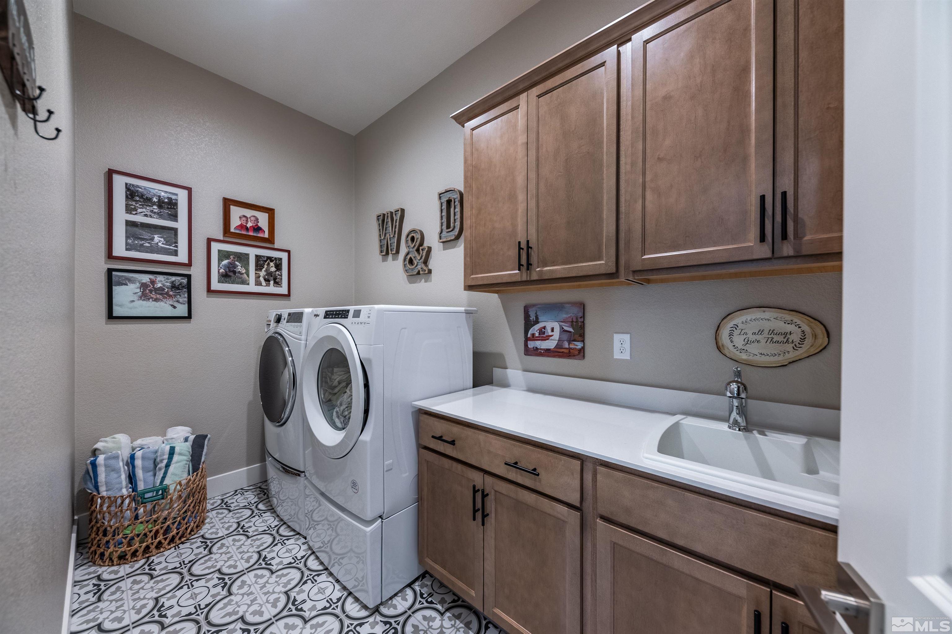 2962 Saddle Peak Drive Reno, NV 89521 - Photo 35 of 39 a utility room with sink dryer and washer