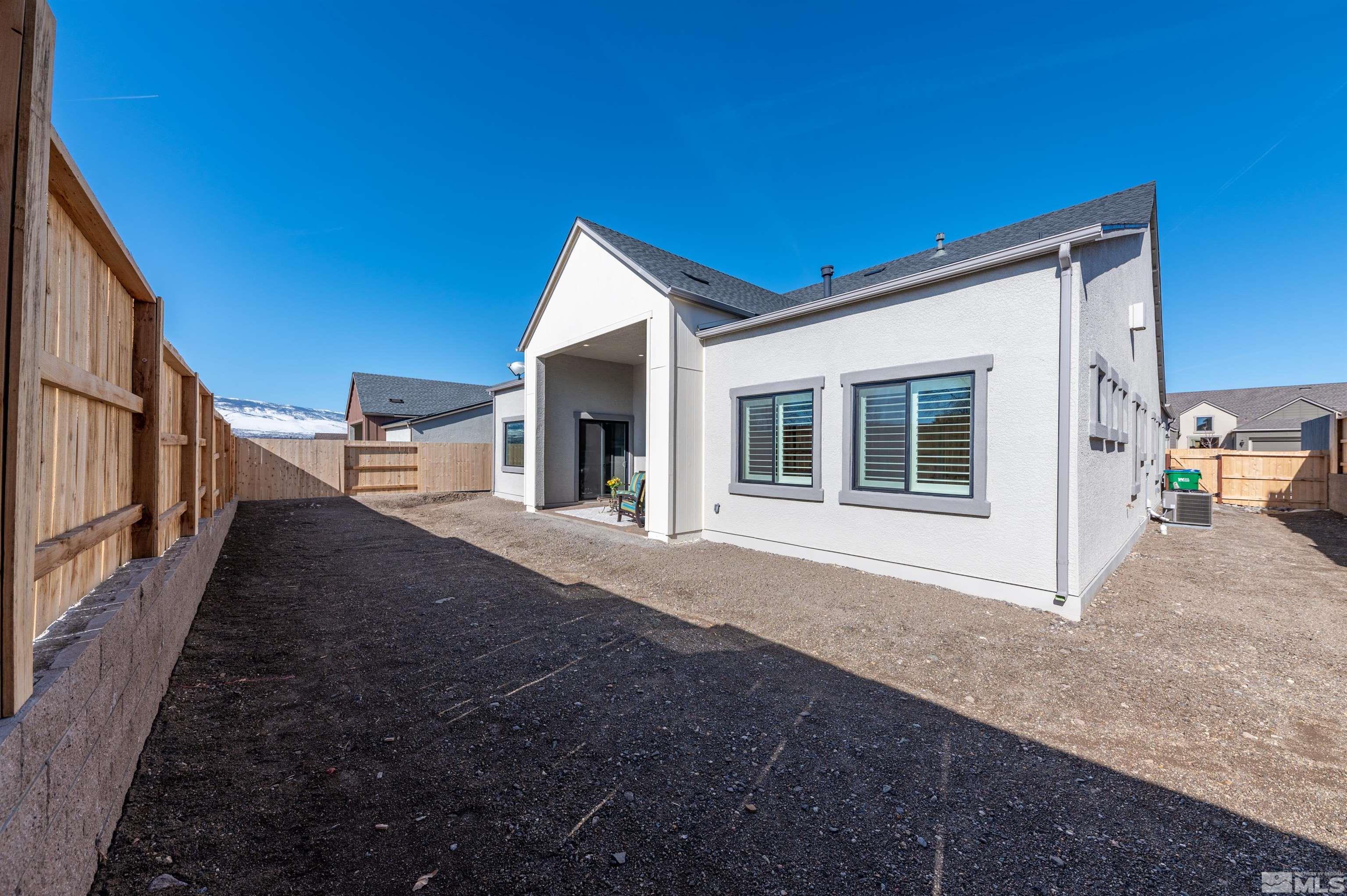 2962 Saddle Peak Drive Reno, NV 89521 - Photo 37 of 39 a view of a house with backyard and porch