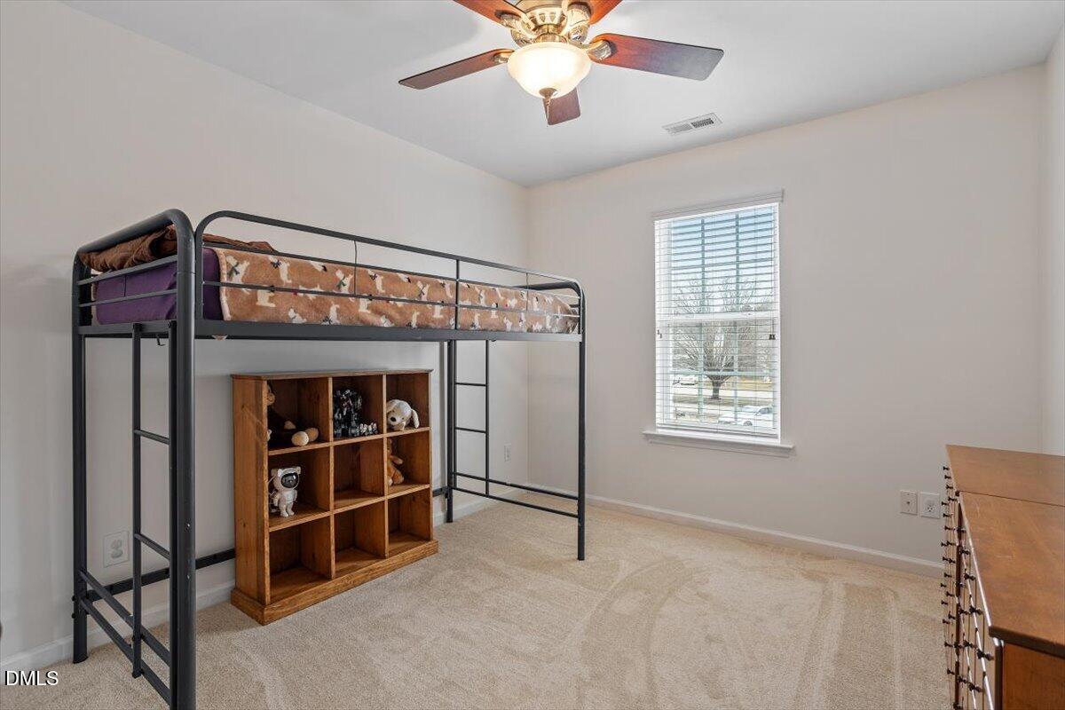 8300 Eel Court Raleigh, NC 27616 - Photo 22 of 36 New carpet in all the bedrooms, hallway and steps