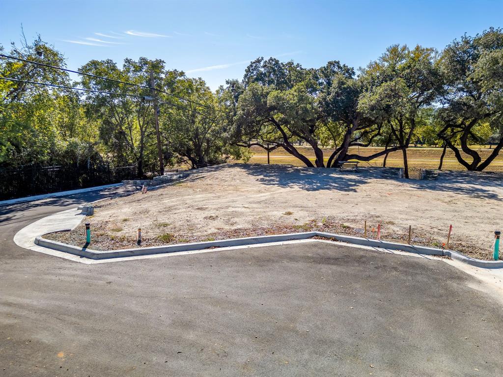628 Athenia Drive Fort Worth, TX 76114 - Photo 24 of 24 a view of a yard with a trees