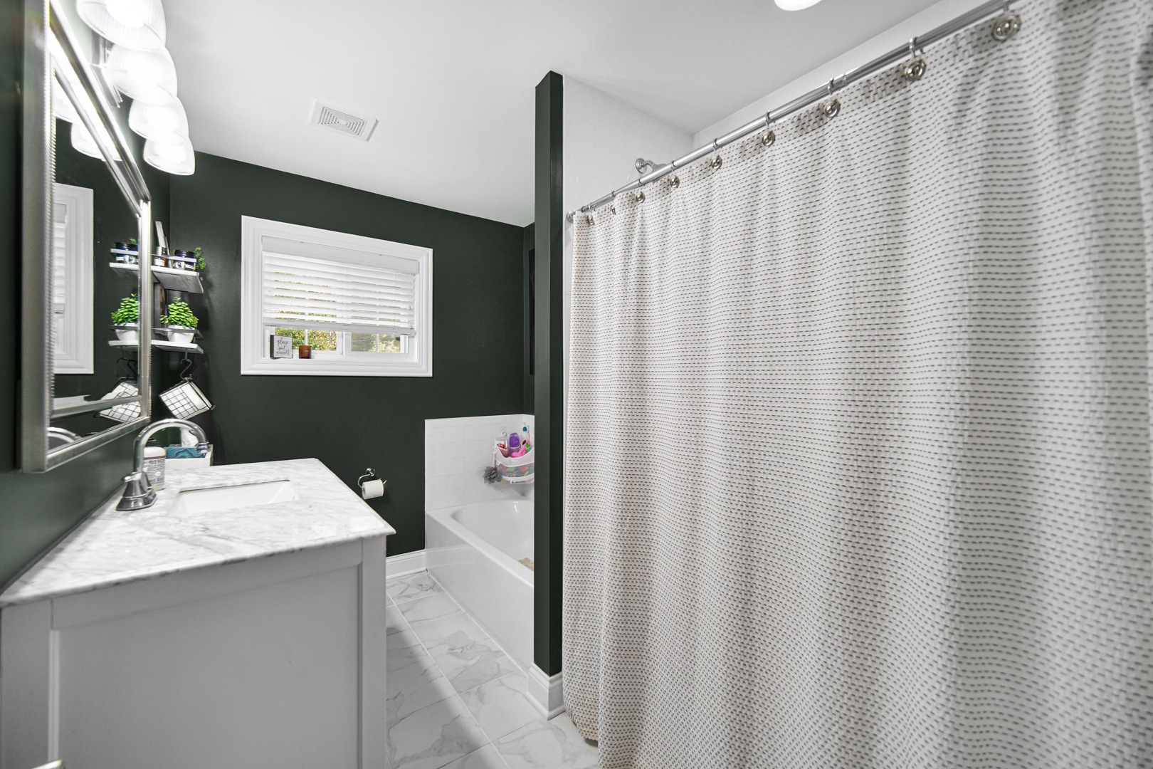 235 Roberts Road New Lenox, IL 60451 - Photo 11 of 25 a bathroom with a sink and a mirror