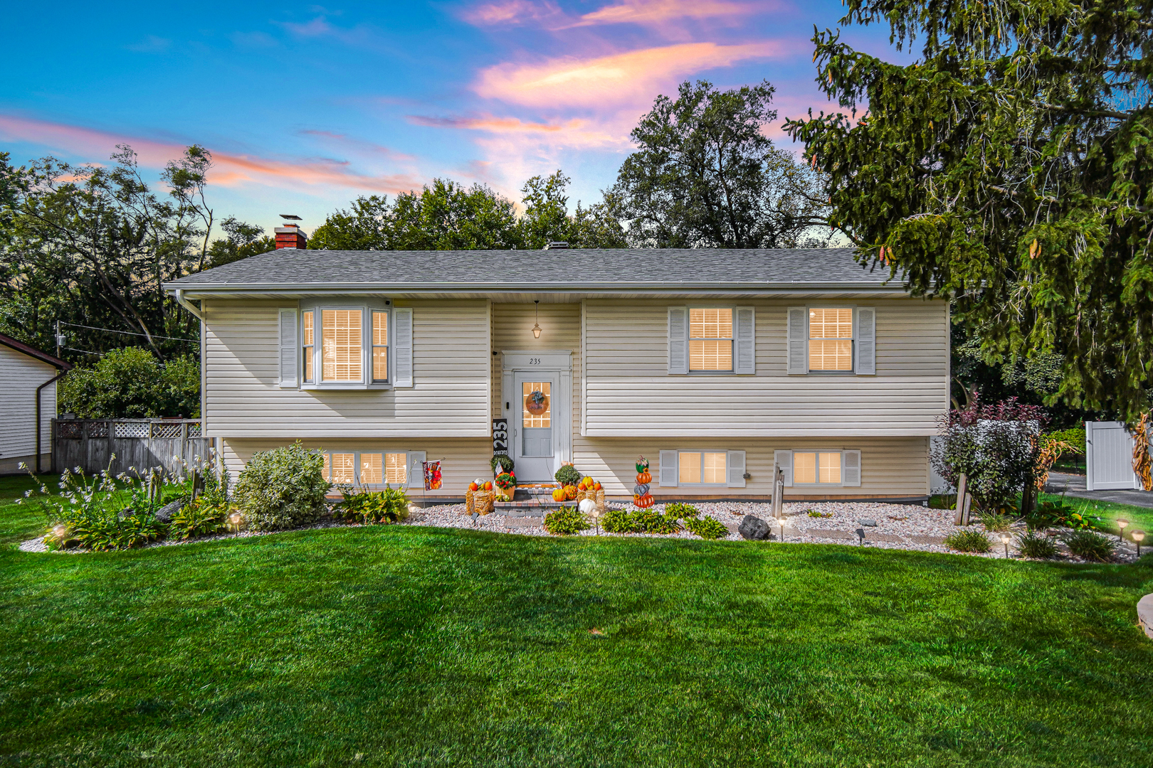 235 Roberts Road New Lenox, IL 60451 - Photo 2 of 25 a view of an house with backyard space and garden