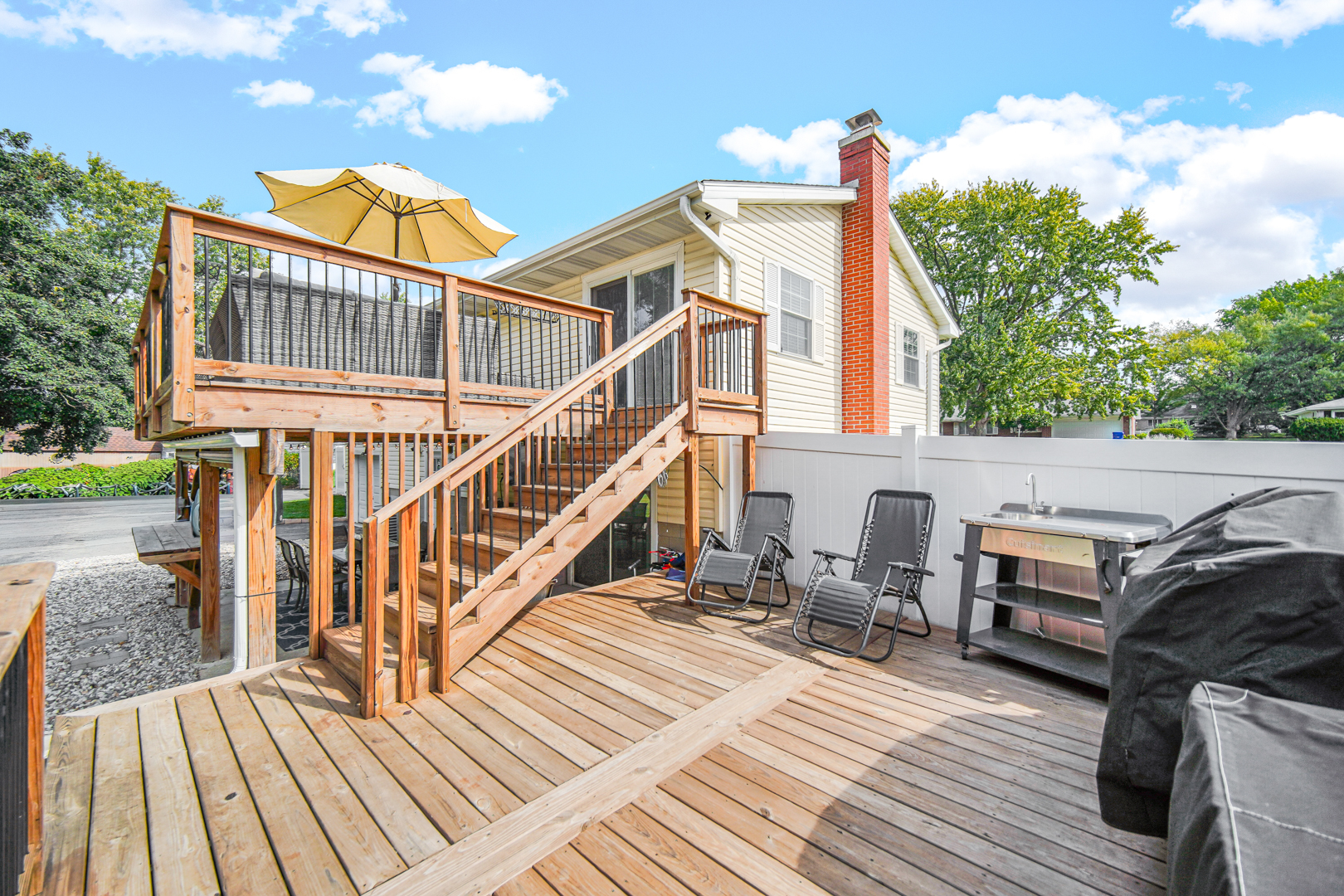 235 Roberts Road New Lenox, IL 60451 - Photo 24 of 25 a view of a house with wooden deck