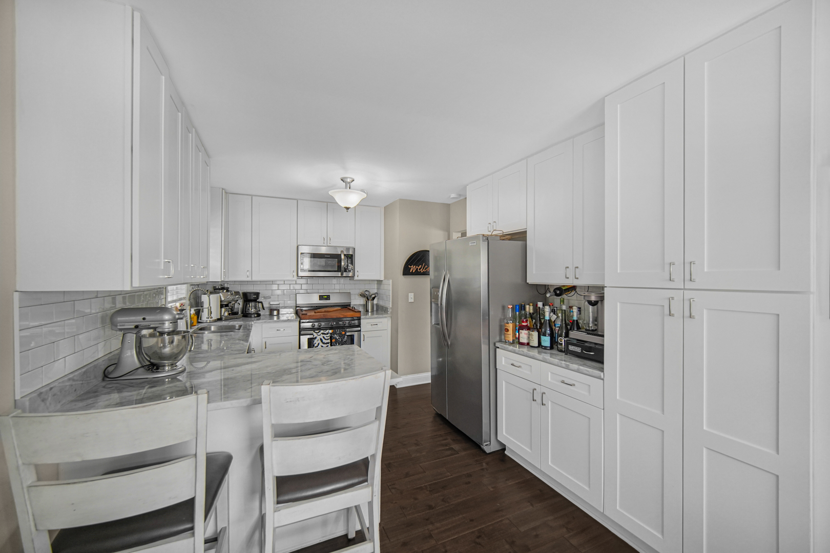 235 Roberts Road New Lenox, IL 60451 - Photo 8 of 25 a kitchen with refrigerator and cabinets