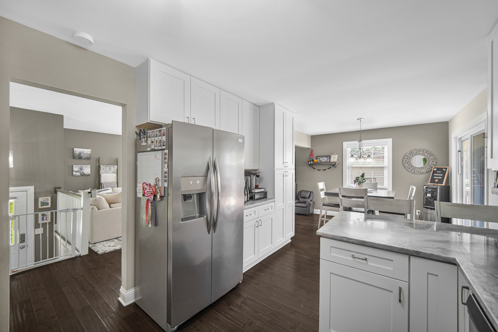 235 Roberts Road New Lenox, IL 60451 - Photo 9 of 25 a kitchen with stainless steel appliances a refrigerator sink and cabinets