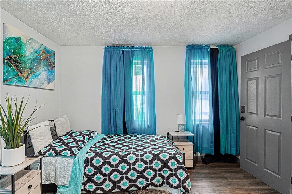 123 Brawner Street Griffin, GA 30223 - Photo 17 of 25 a bedroom with a bed and a window