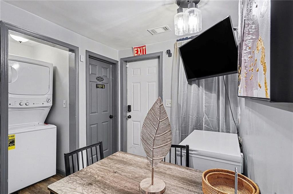 123 Brawner Street Griffin, GA 30223 - Photo 5 of 25 a living room with furniture and a flat screen tv
