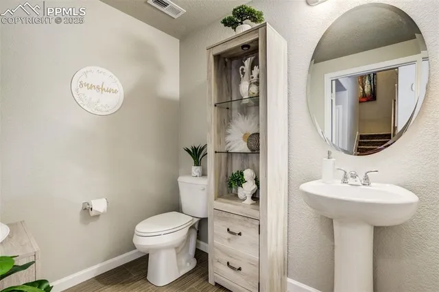 a view of entryway with stairs and wooden floor
