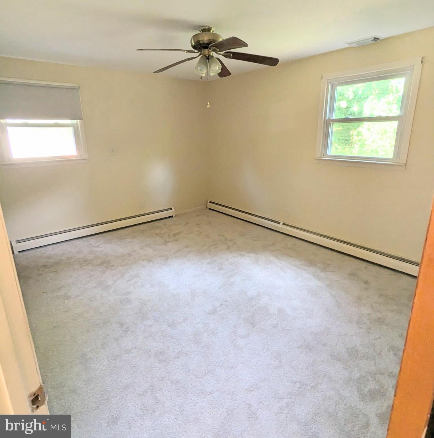 5807 Farmview Avenue Baltimore, MD 21206 - Photo 10 of 14 a view of an empty room with a window