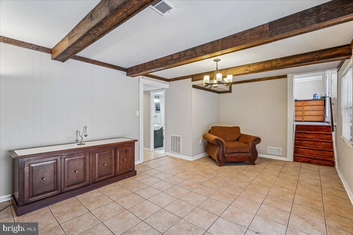 1521 Billman Lane Silver Spring, MD 20902 - Photo 13 of 33 a room with furniture and wooden floor