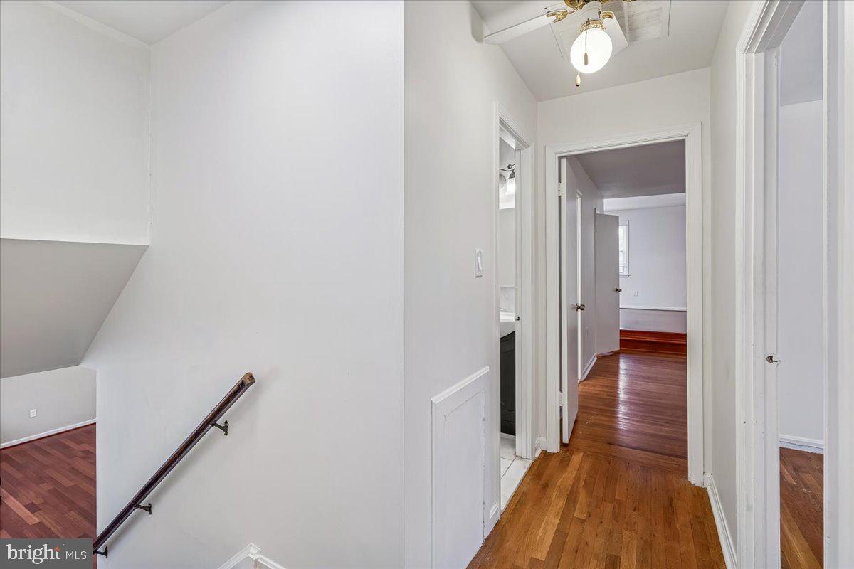 1521 Billman Lane Silver Spring, MD 20902 - Photo 14 of 33 a view of a hallway with wooden floor