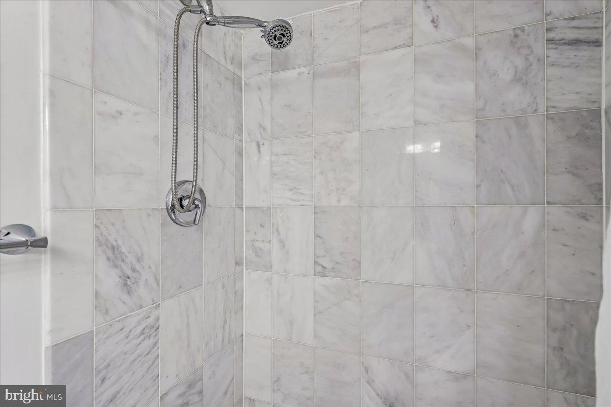 1521 Billman Lane Silver Spring, MD 20902 - Photo 25 of 33 a bathroom with a shower
