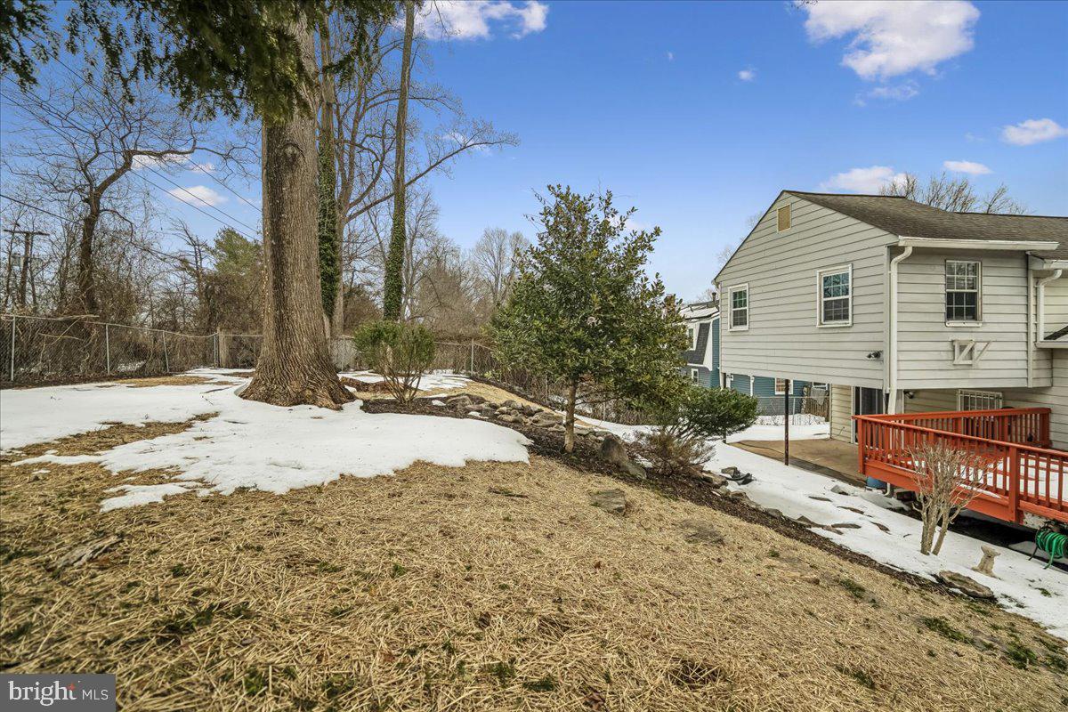 1521 Billman Lane Silver Spring, MD 20902 - Photo 3 of 33 a view of a house with a yard covered in snow