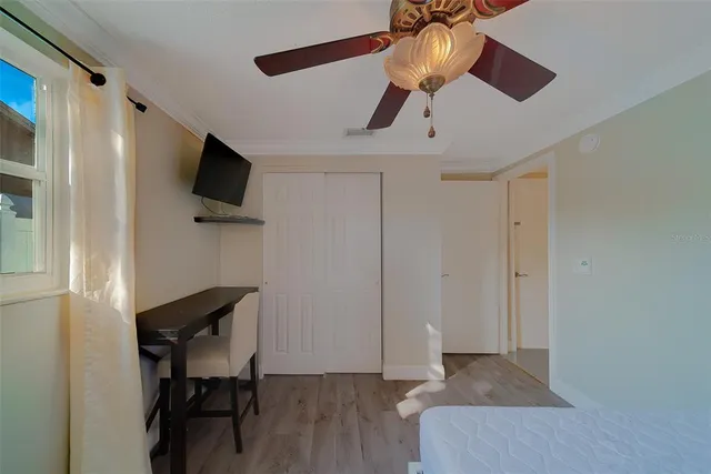 a view of a big room with large windows and city view