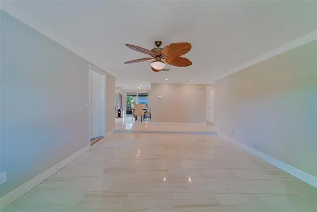 a view of a hallway with a window