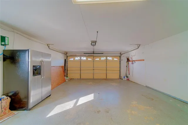 a view of a room with large windows