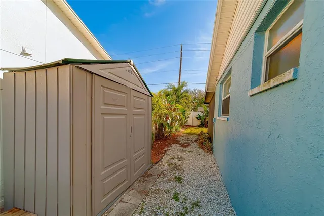a view of swimming pool with a backyard