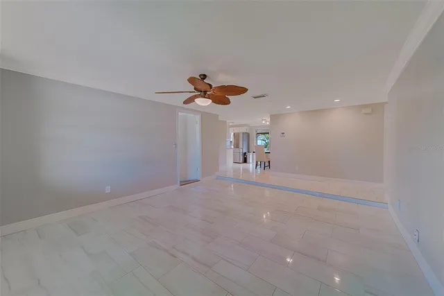 a view of a livingroom with a ceiling fan