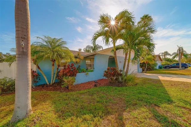 an aerial view of residential building and ocean