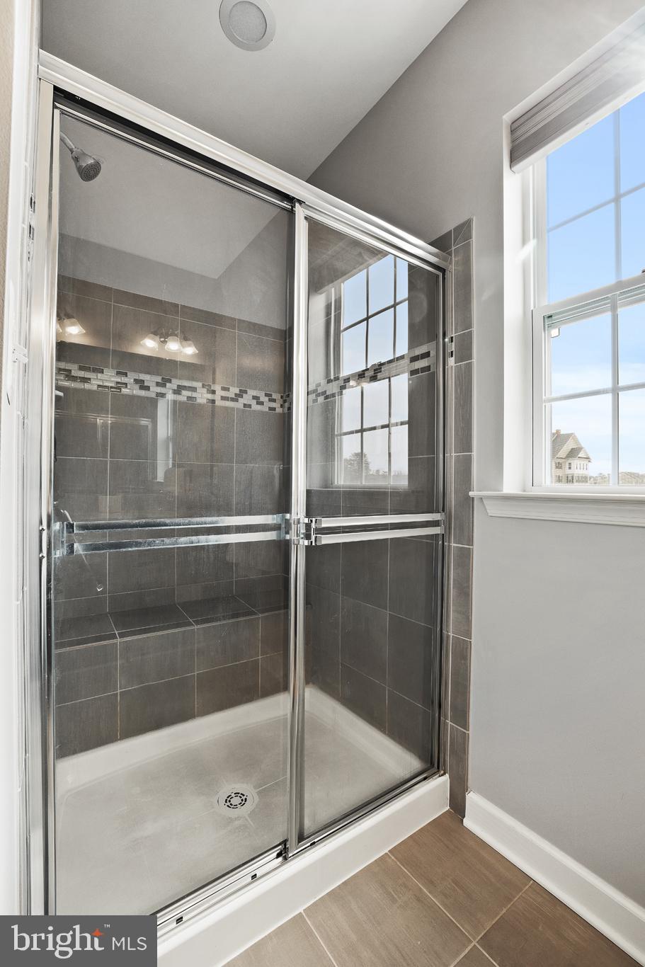 409 Bright Star Path Pasadena, MD 21122 - Photo 23 of 38 Large Tiled Shower