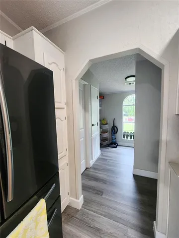a bathroom with double sink and two mirror