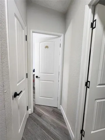 a bathroom with a shower and a sink