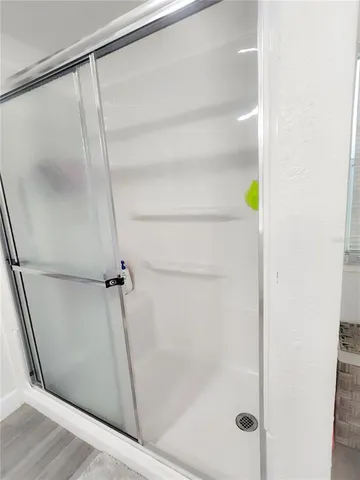 a view of outdoor space with swimming pool and trees