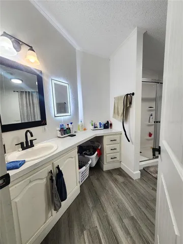 an aerial view of a residential houses with outdoor space