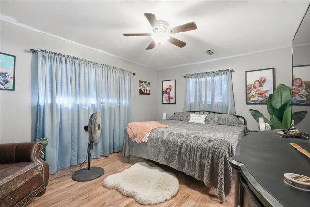 a bed room with a bed and furniture