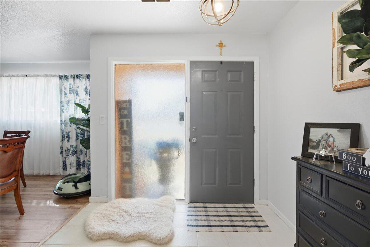 3816 44th Street Lubbock, TX 79413 - Photo 3 of 36 a view of livingroom with furniture and window