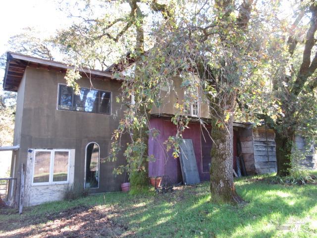 20515 Fort Ross Road Cazadero, CA 95421 - Photo 17 of 17 front view of a house with a yard