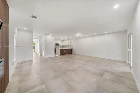 a view of kitchen and a sink