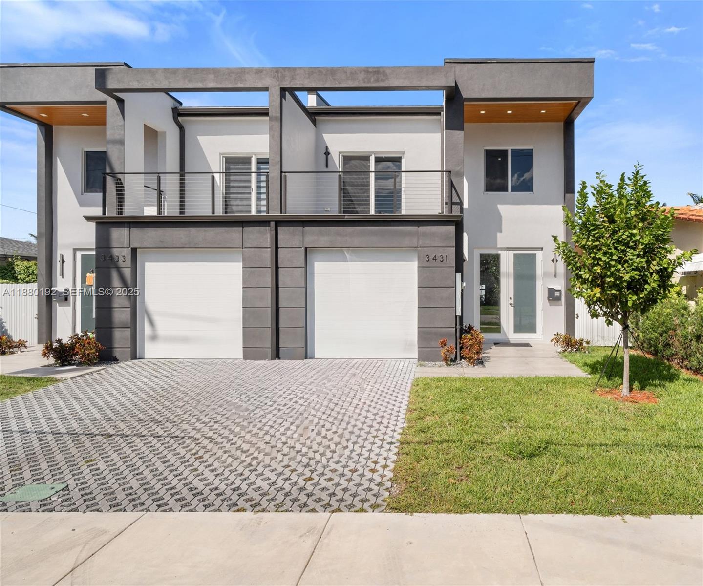3431 Southwest 16th Terrace Miami, FL 33145 - Photo 2 of 33 a front view of a house with garden
