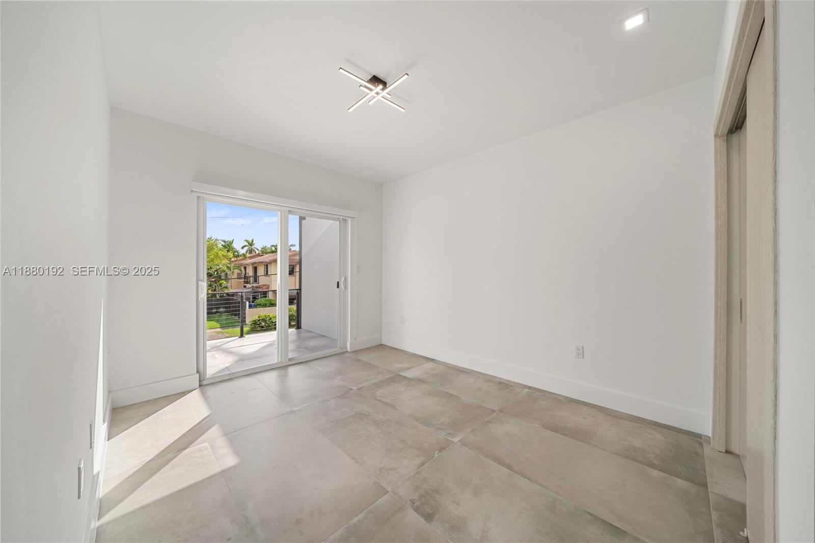 3431 Southwest 16th Terrace Miami, FL 33145 - Photo 21 of 33 a view of an empty room and window