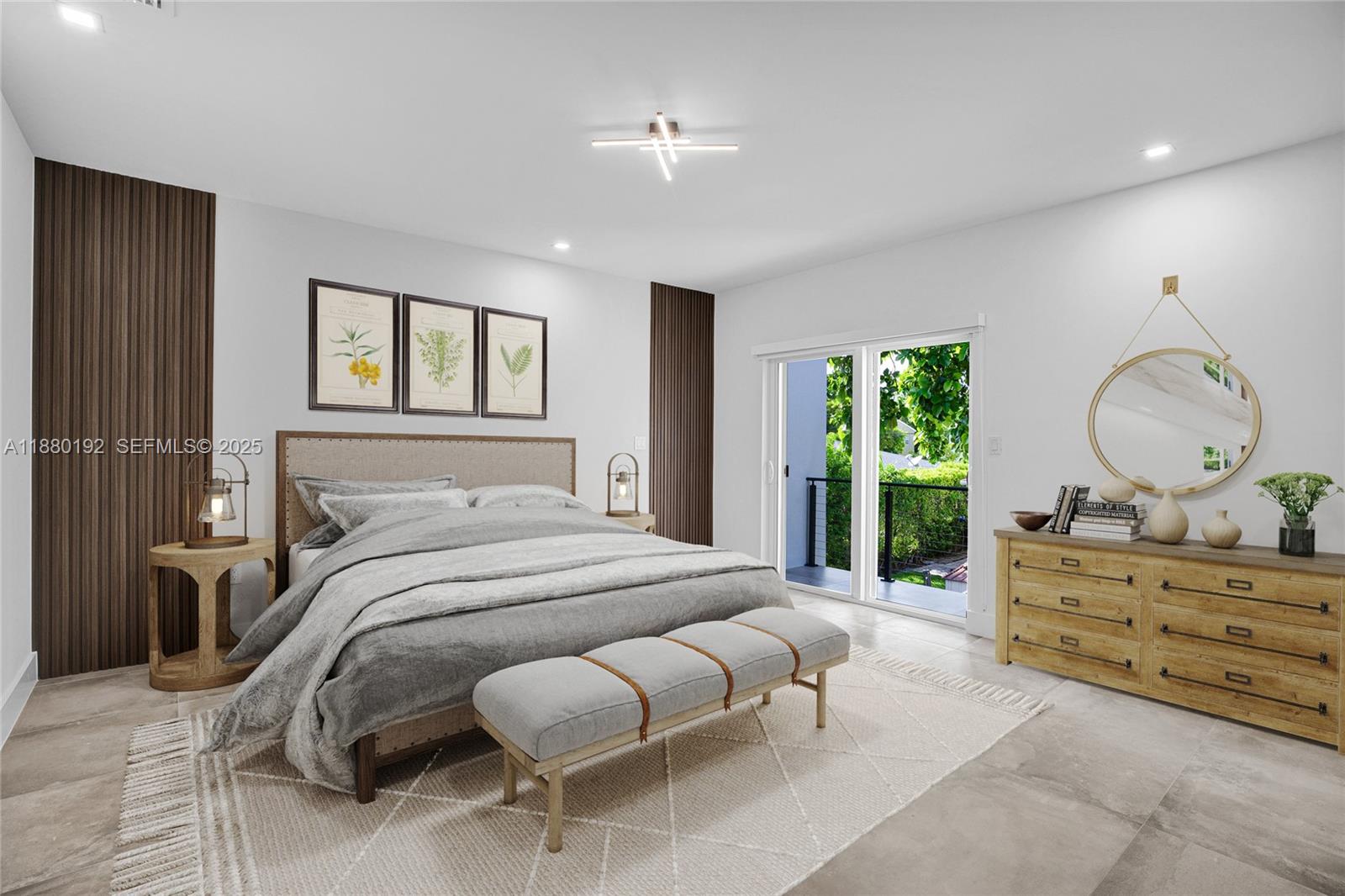 3431 Southwest 16th Terrace Miami, FL 33145 - Photo 6 of 33 a bedroom with a bed mirror and window