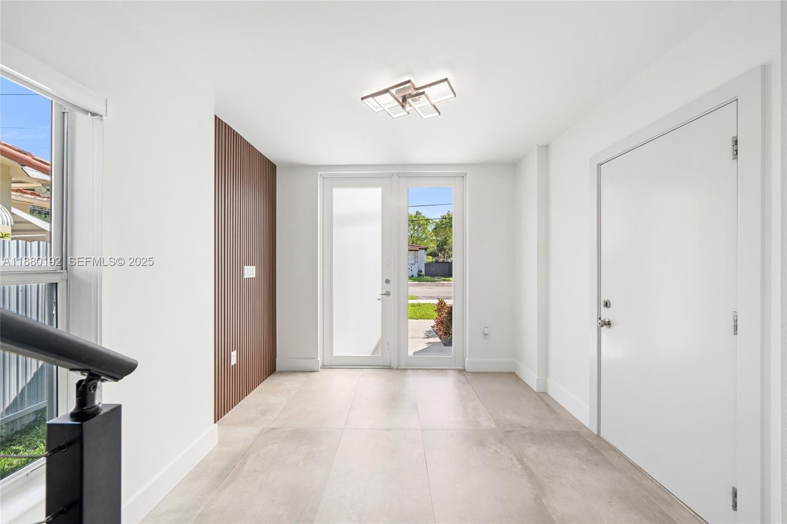 3431 Southwest 16th Terrace Miami, FL 33145 - Photo 8 of 33 a view of a hallway with a yellow space