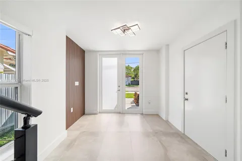 a view of a hallway with a yellow space