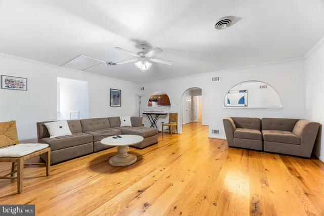 a living room with furniture and a couch