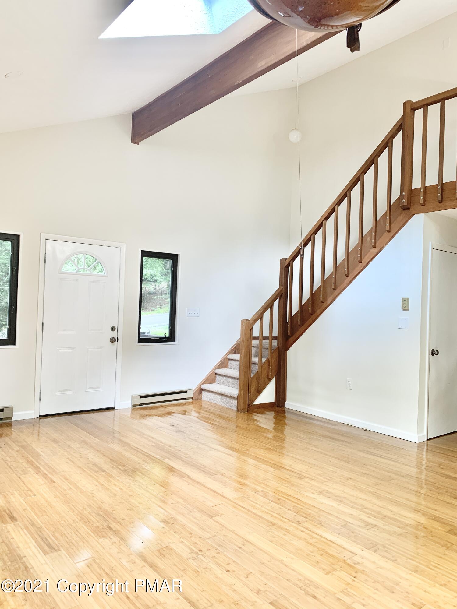 185 Canterbury Road Bushkill, PA 18324 - Photo 3 of 27 a view of an entryway with wooden floor
